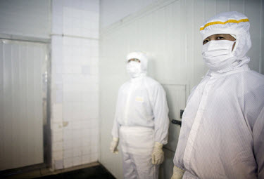 Guards at the closed Tianyang Food Processing Ltd. dumpling factory. Traces of methamidophos, an insecticide banned in many countries, were found in the dumplings, on the packaging and in the vomit of...