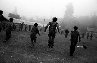 Young Maoists excersise early in the morning in a village in Rolpa District, one of the Maoist strongholds during the 1996 - 2006 civil war.