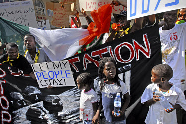 Children join the demonstrators at a large protest march, in which hundreds of African asylum seekers marched through the streets of Tel Aviv, calling upon Israeli authorities to grant them asylum.