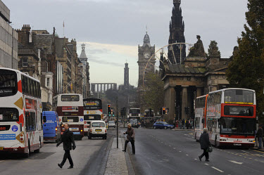 Princes Street, Edinburgh's principle shopping street, with Calton Hill monuments rising behind, and the National Gallery of Scotland on the right.