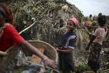 Girls collecting rubbish for resale. At the end of each day, they earn TK 55 to 70 (USD 1). The Matuail Dump is one of three waste sites in Dhaka, a city of over ten million people. On average, 5,000...