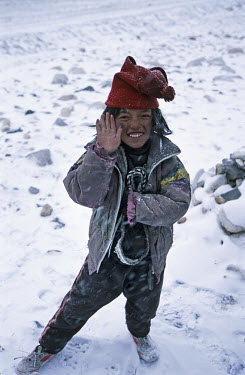 Young boy in the snow between Rongbuk Monastery (5,032 metres) and Everest Base Camp (5,200 metres).