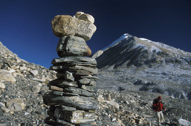 Trekker passing a cairn as he descends from Camp I (5,460 metres) to Everest Base Camp (5,200 metres).