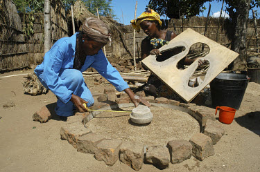 Women making toilets - an initiative by Sightsavers in cooperation with Wateraid to cut infections and improve villagers' health.
