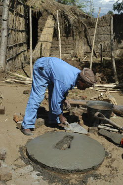 Women making toilets - an initiative by Sightsavers in cooperation with Wateraid to cut infections and improve villagers' health.