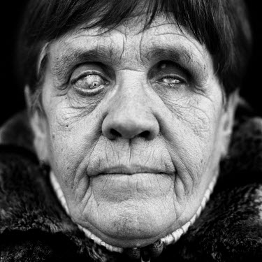 Elena Griczienko (German, born in USSR, 1939), blinded during the Second World War (WWII). ^I was too small to remember the train journey. I only know it through my mother. The German army in the Ukra...