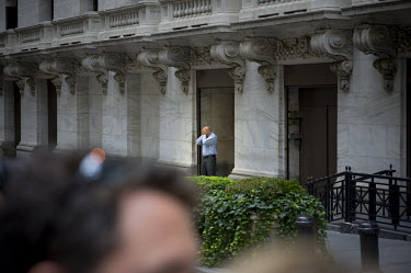 A banker on Wall Street on the day when share prices plummeted after the US Government failed to reach an agreement to bail out the country's ailing financial institutions.