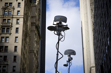 Mobile broadcast antennas on Wall Street outside the New York Stock Exchange (NYSE) on the day when share prices plummeted after the US Government failed to reach an agreement to bail out the country'...