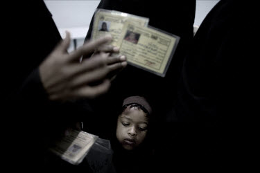 Women and children at a health clinic in the Asafea neighbourhood of Sana'a, where the majority of Somali refugees live. In 2008 over 40,000 Somali refugees have arrived in Yemen, bringing the total n...