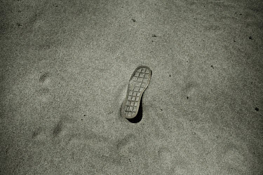 The sole of a shoe, left behind by Somali refugees coming to Yemen by boat, outside the Ahwar reception centre. In 2008 over 40,000 Somali refugees have arrived in Yemen, bringing the total number clo...