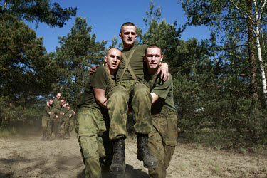 Young soldiers exercising at the practice range. This year's class of drafted recruits is the final one after 90 years of compulsory military service, as Poland's army turns professional in 2009.