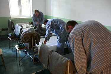 New conscripts make their beds at the barracks. This year's class of drafted recruits is the final one after 90 years of compulsory military service, as Poland's army turns professional in 2009.