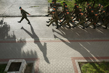 Soldiers drill at the Bartoszyce military base. This year's class of drafted recruits is the final one after 90 years of compulsory military service, as Poland's army turns professional in 2009.