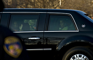Following the inauguration of Barack Obama as the 44th President of the United States, his wife Michelle and daughter Sasha are shown driving by limousine down the parade route from the Capitol to the...