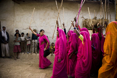 47 year old Sampat Pal Devi, founder and leader of the 10,000 strong Gulabi Gang, leads a group of women on a march through Banda. In the badlands of Bundelkhand, one of the poorest parts of one of In...