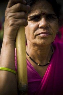 47 year old Sampat Pal Devi, founder and leader of the 10,000 strong 'Gulabi Gang' (Pink Gang). Pal Devi, an impoverished mother of five, has emerged to become something of a messianic figure in the r...
