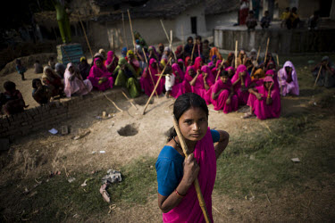 22 year old Aarti Devi, a member of the 'Gulabi Gang' (Pink Gang). In the badlands of Bundelkhand, one of the poorest parts of one of India's most populous states, a gang of female vigilantes have spr...