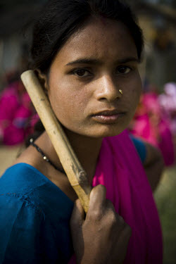 22 year old Aarti Devi, a member of the 'Gulabi Gang' (Pink Gang). In the badlands of Bundelkhand, one of the poorest parts of one of India's most populous states, a gang of female vigilantes have spr...