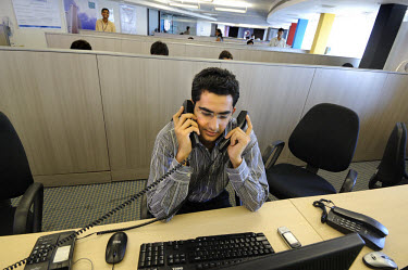 Dealer in the trading room of a stock/share company registered on the Bombay Stock Exchange.