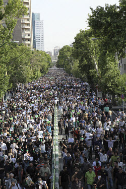 Silent protest. An estimated one million people form a human chain along Vali asr Avenue, the longest street in Tehran. Following a disputed election result, thousands of supporters of opposition cand...