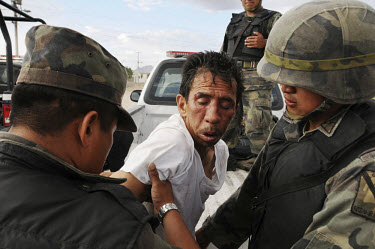 A man suspected of beating his wife is arrested in Ciudad Juarez.