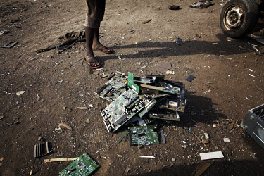 Computer circuit boards begin to pile up at Agbogbloshie dump, which has become a dumping ground for computers and electronic waste from all over the developed world. Hundreds of tons of e-waste end u...