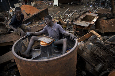 Children take a break from burning cables at Agbogbloshie dump, which has become a dumping ground for computers and electronic waste from all over the developed world. Hundreds of tons of e-waste end...