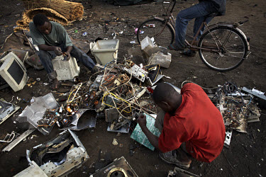 Computer monitors are broken apart to salvage metal and circuit boards, at Agbogbloshie dump, which has become a dumping ground for computers and electronic waste from all over the developed world. Hu...