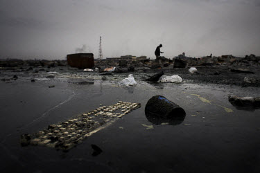 A keyboard lies in a polluted lagoon at Agbogbloshie dump, which has become a dumping ground for computers and electronic waste from all over the developed world. Hundreds of tons of e-waste end up he...