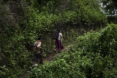 Zeme Naga villagers from Mabauram village patrol the area and provide security to other villagers. Recent ethnic clashes between the Dimasa and Zeme Naga tribals have left scores of people dead and te...