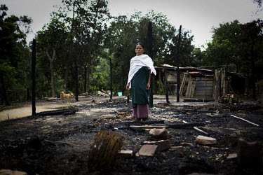 Ronsomo Langthasa stands on the spot where her house once stood. On the 8th of May 2009, suspected Zeme Naga militants burnt down 10 of the 13 houses in the Dimasa village of Jorai, sparing the school...