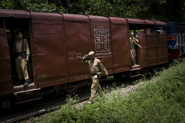 Soldiers from the Central Reserve Police Force (CRPF) and Assam Police provide security to the goods train in Haflong city. The Dima Halim Daogah (Jewel faction), a militant Dimasa group also known as...