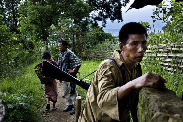 Zeme Naga villagers from Mabauram village patrol and provide security to other villagers. Recent ethnic clashes between the Dimasa and Zeme Naga tribals have left scores of people dead and tens of tho...