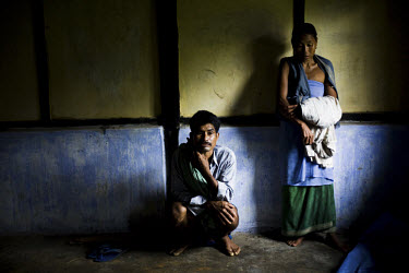 Johendra Longmalai with his wife Joiso Longmalai at the Dimasa community centre in Jorai village. On the 8th of May 2009, suspected Zeme Naga militants burnt down 10 of the 13 houses in the Dimasa vil...