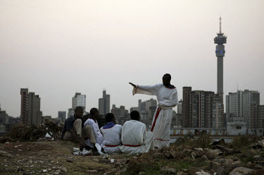 Members of a Zionist Church worship on a hilltop near Yeoville in central Johannesburg.