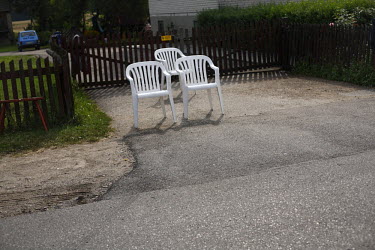 Chairs set out at the side of the road for people watching the Tour De Pologne bicycle race.