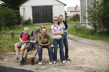 Teenagers watching the Tour De Pologne bicycle race.