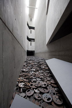 The Jewish Museum in Berlin, by architect Daniel Libeskind. The metal faces, leading into the void, are by the Israeli artist Menashe Kadishman.