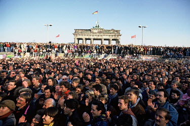 Thousands of people rushed to the Berlin Wall in the first few days after the opening of the Wall on November 9th, 1989.