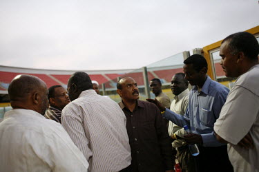 The Sudanese ambassador to Nigeria argues with Sudanese national football team managers after the warm up at the Ohene Djan Sports Stadium in Accra on the eve of the qualifying match with Ghana for th...