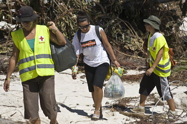 Red Cross volunteers searching the beaches in the Aleipata District. More than 170 people died when a tsunami triggered by an 8.3 magnitude earthquake hit Samoa and neighbouring Pacific islands on 29/...