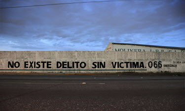 'No existe delito sin victima', meaning 'there is no crime without a victim'. This is an advertisement for victims of crime to call the emergency number 066 to report the crime. Recent studies have sh...