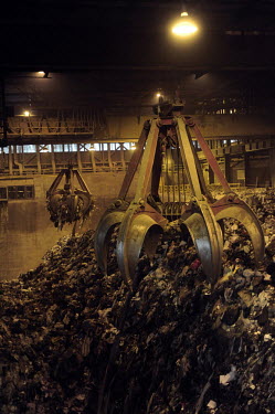 Covanta Waste-to-Energy plant, Westbury, New York. The plant feeds rubbish into giant furnaces that produce steam to turn a turbine and produce electricity.