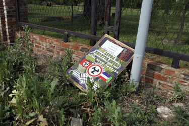 A poster lies on the ground advertising a meeting for the rebirth of the extreme right-wing Afrikaner Weerstandsbeweging (AWB) (Afrikaner Resistance Movement) in Ventersdorp.