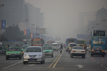 Air pollution and traffic in Xian. With growing wealth and private car use, traffic jams and increasing air pollution is becoming common in many Chinese cities.