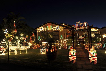 Jeff Arendson's home in the neighbourhood of Bothasig, where residents haul out their Christmas decorations and go to town lighting up the outside of their homes. With little regard to cost or effort,...