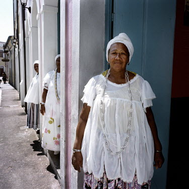 70 year old Irmana Joselita (front) has been a member of the Irmandada da Boa Morte (Sisterhood of the Good Death) for 18 years. The Sisterhood began as a bank in 1823, founded by freed slaves, to fin...