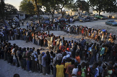 A queue for food aid distribution in the Delmas area of the city, ten days after an earthquake hit the country. A 7.0 magnitude earthquake struck Haiti on 12/01/2010. Early reports indicated that more...