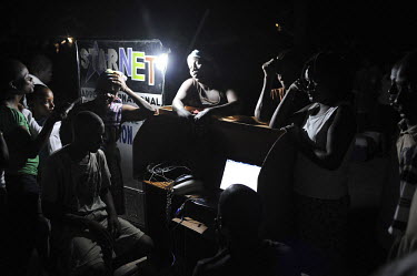 In a park in the centre of Port-au-Prince, some people with an electricity generator have set up an impromptu internet cafe. There is still no power in the city twelve days after an earthquake hit the...