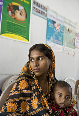 A mother and child at a health clinic run by the Patuakhali Development Centre.